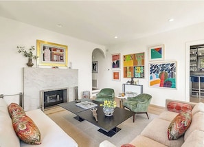 Smart TV, fireplace, books