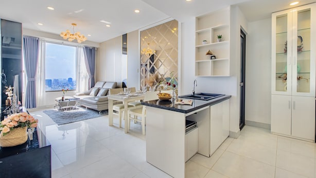 A modern apartment with a kitchen, dining area, and living room. - The Grand Saigon Apartment - City Centre (Ho Chi Minh City)