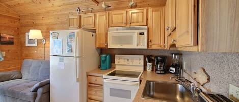 Fridge, microwave, stovetop, cookware/dishes/utensils