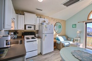 Fridge, microwave, stovetop, cookware/dishes/utensils