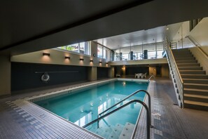 Indoor pool, a heated pool - Boho Chic Condo w/Balcony, Shared Grills, Hot Tub, Pool - near Pike Place Market (Seattle)
