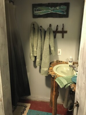 Hair dryer, towels, soap, shampoo