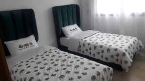 2 quartos, acesso à internet, roupa de cama