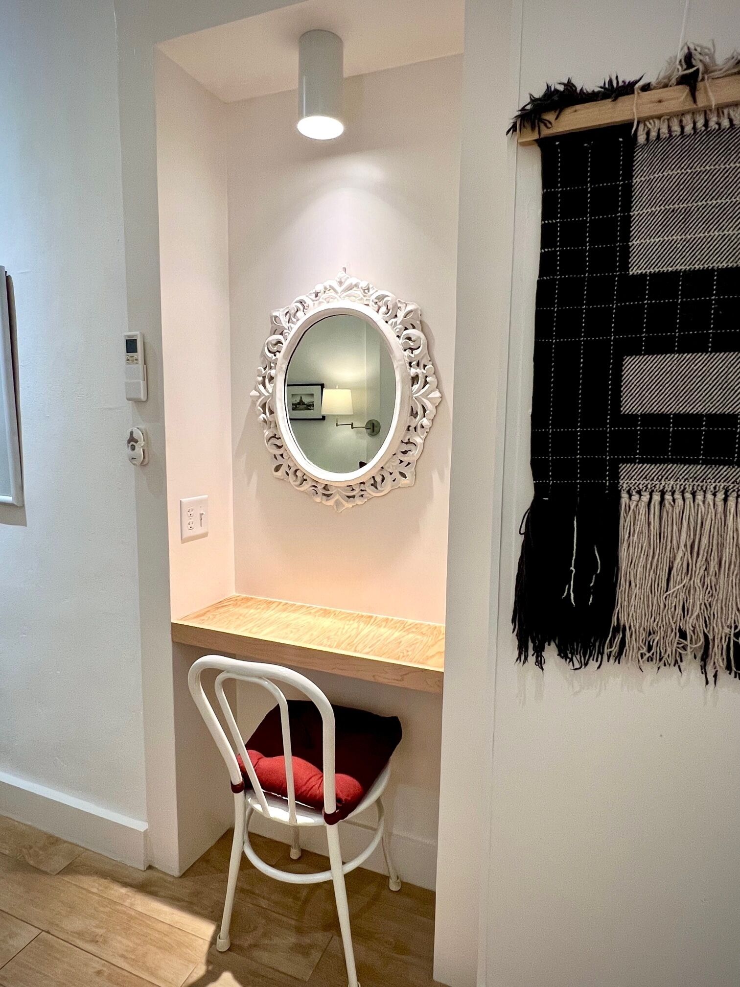 A nook with lighting, electric socket for your laptop or electronic media
