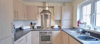 A modern 3 double bedroom house in Camber, Rye near the sand dunes & beach.