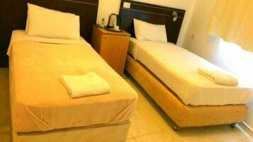 Deluxe Double or Twin Room | Minibar, in-room safe, individually decorated, individually furnished