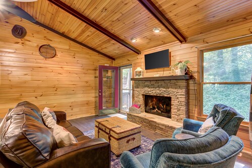 Dog-friendly, creek-side cabin with hot tub, open floor plan & multi-level decks