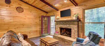 Dog-friendly, creek-side cabin with hot tub, open floor plan & multi-level decks