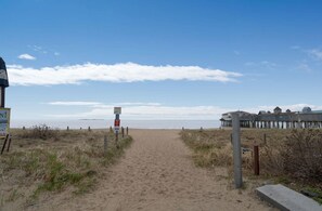 On the beach, sun-loungers, beach towels