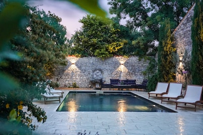 Character house with a pool in the middle of a historic village