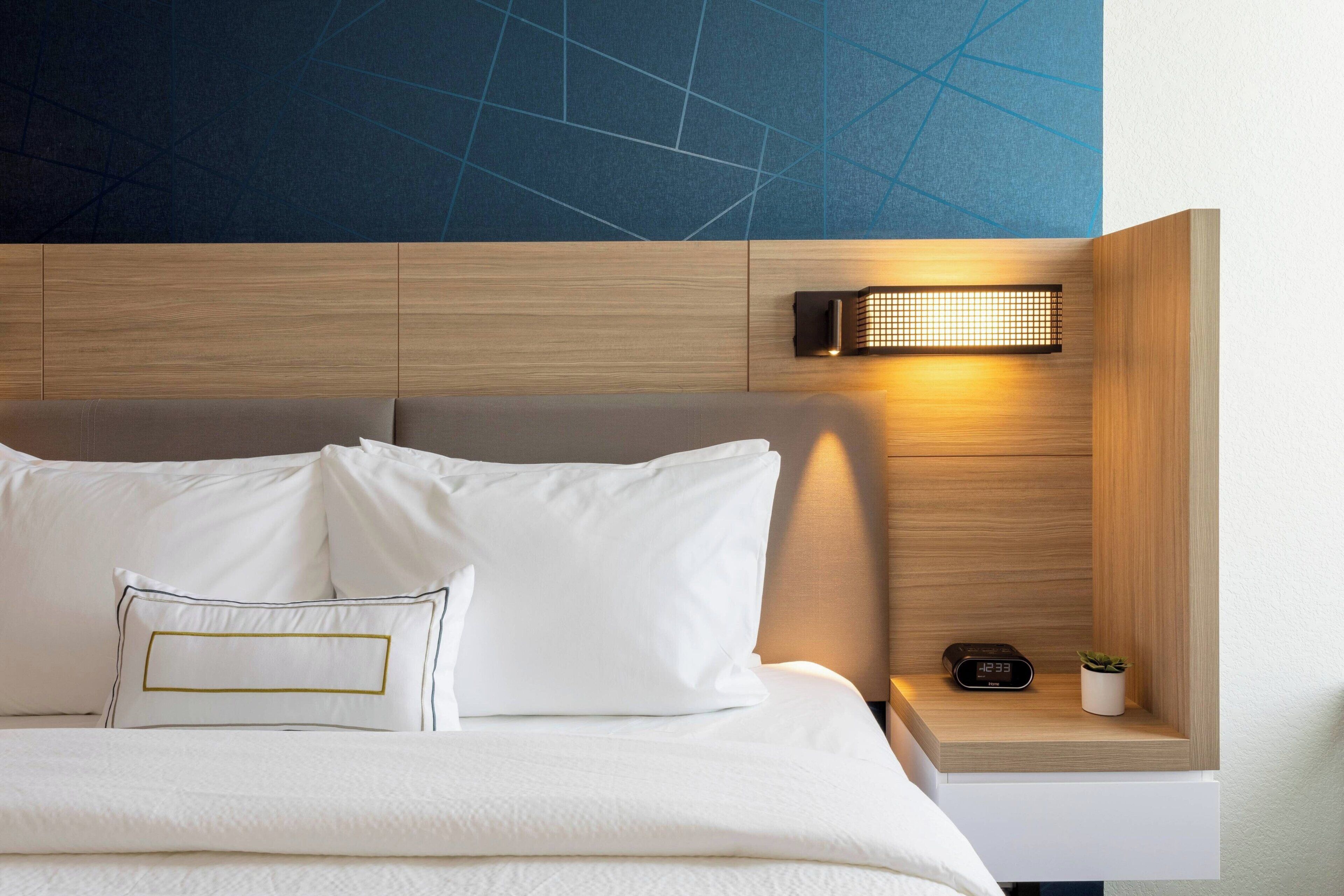 desk, laptop workspace, blackout curtains, iron/ironing board