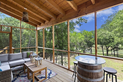 Riverside Retreat with River Access and Stunning views!