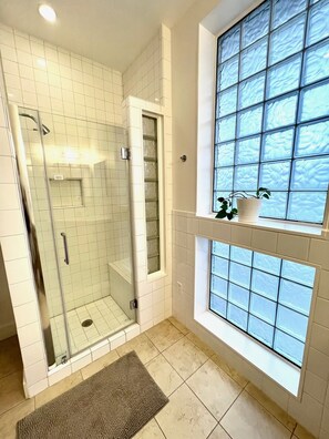 Shower, hair dryer, towels, soap