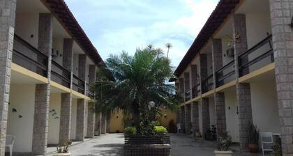 2-bedroom apartment with air conditioning very close to Praia do Forte beach.
