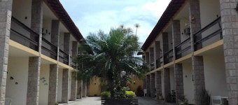 2-bedroom apartment with air conditioning very close to Praia do Forte beach.