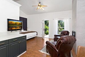 Tabla de planchar con plancha, wifi gratis y ropa de cama 