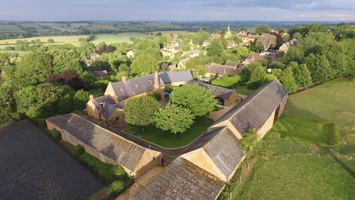 Luxury Barn conversion in village farm setting.