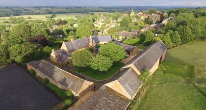 Luxury Barn conversion in village farm setting.