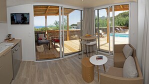 Luxury Chalet, 4 Bedrooms, Sea View | Living area - Camping Au Paradis des Campeurs (Roquebrune-sur-Argens)