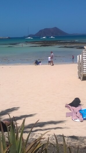 On the beach, beach towels