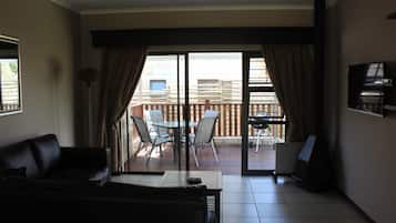 Standard Chalet | Living room | Flat-screen TV, fireplace