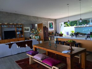 Beachfront Villa 1 | Living area | Flat-screen TV - Coast Cook Islands - 3-Bedroom Beachfront Pool Villa (Rarotonga)