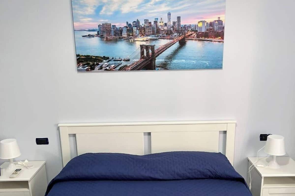 Family Room | Down comforters, minibar, individually furnished, desk