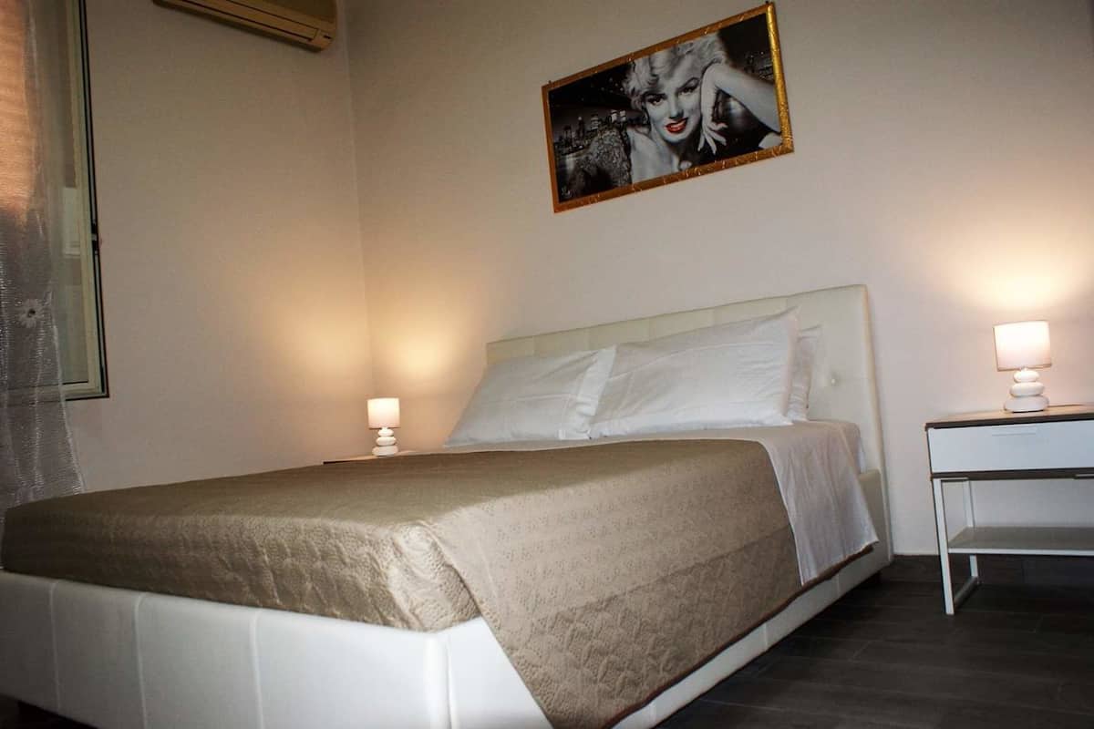 Quadruple Room | Down comforters, minibar, individually furnished, desk