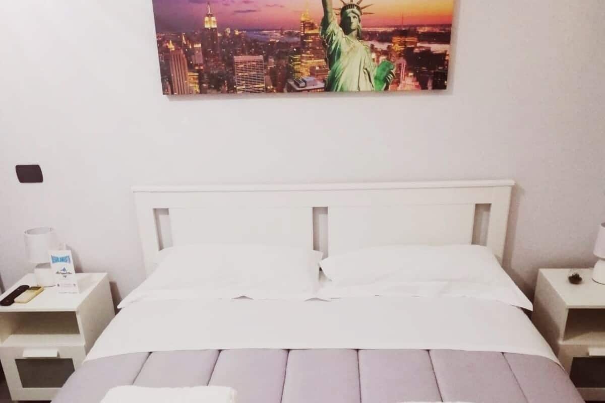 Luxury Quadruple Room | Down comforters, minibar, individually furnished, desk