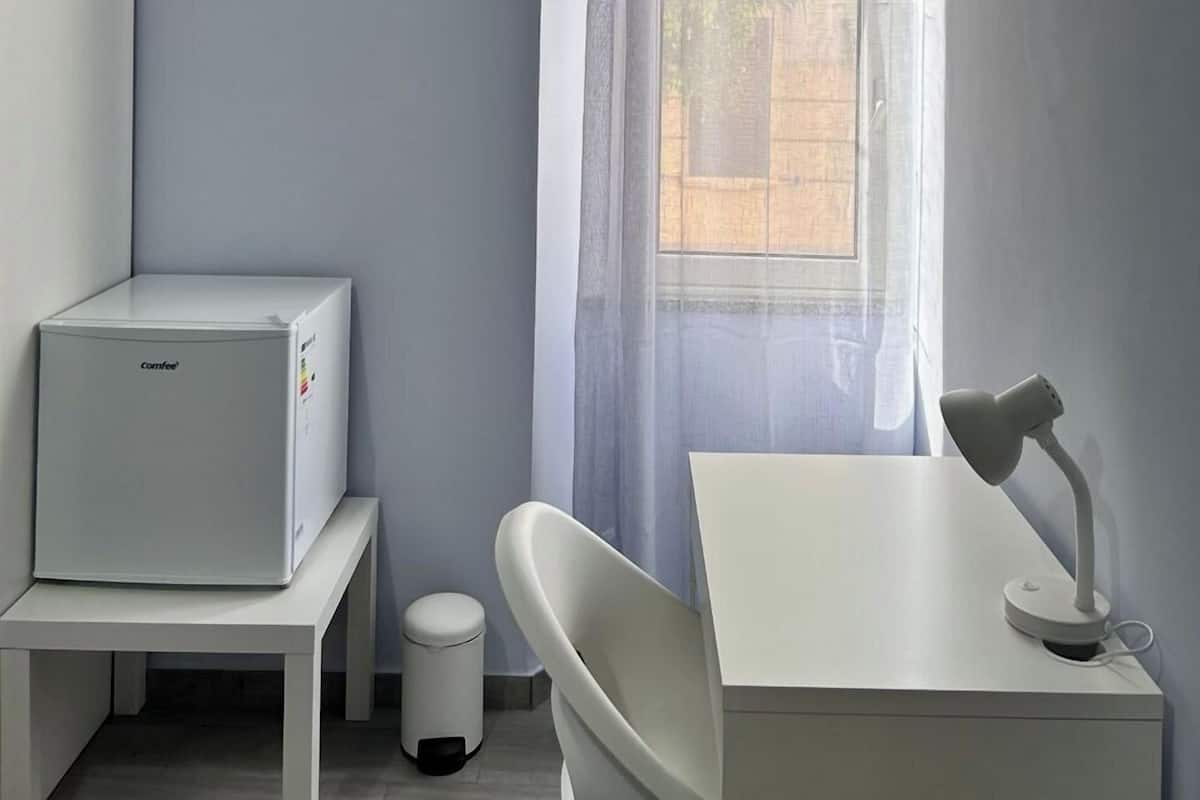 Habitación familiar | Edredones de plumas, minibar, mobiliario individual y escritorio