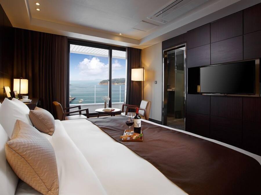 Balcony Twin Room | Down comforters, desk, blackout drapes, free WiFi