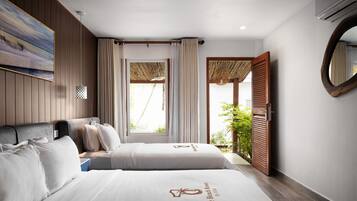 Deluxe Family Garden View | Minibar, Schreibtisch, laptopgeeigneter Arbeitsplatz