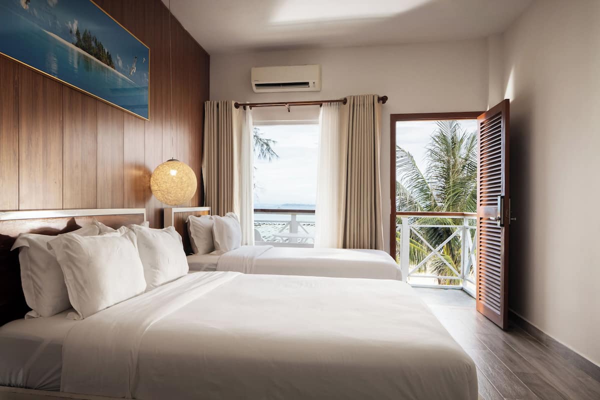 Family Suite - 1st Floor | 2 bedrooms, minibar, desk, laptop workspace
