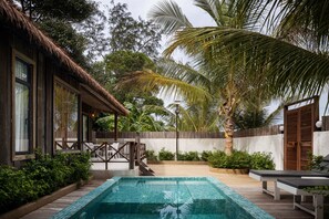 Outdoor pool, pool umbrellas, sun loungers - One Beach Resort by EHM (Koh Rong Sanloem)