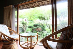 Family Room, Non Smoking | Minibar, in-room safe, laptop workspace, iron/ironing board