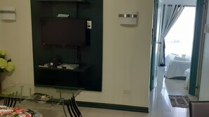 Condo, 1 quarto | Área de estar | TV de tela plana