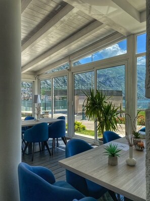 Breakfast, dinner served; international cuisine, beach views