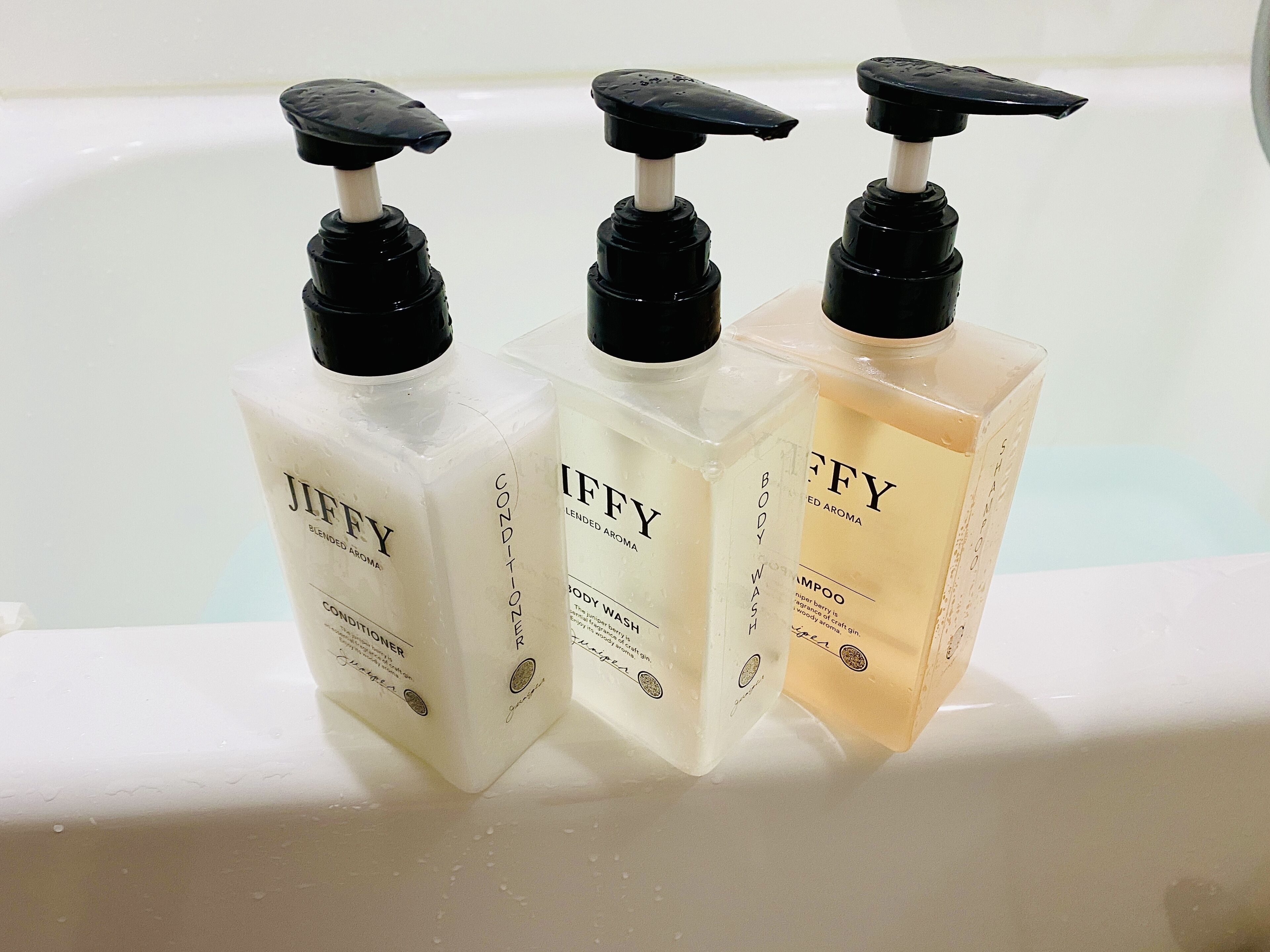 combined shower/bathtub, deep-soaking bathtub, hair dryer, slippers