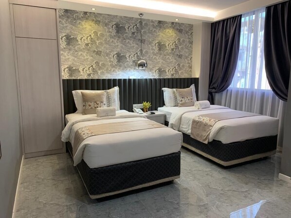 Twin Room | Desk, free WiFi, bed sheets - Red City Hotel (Lawas)