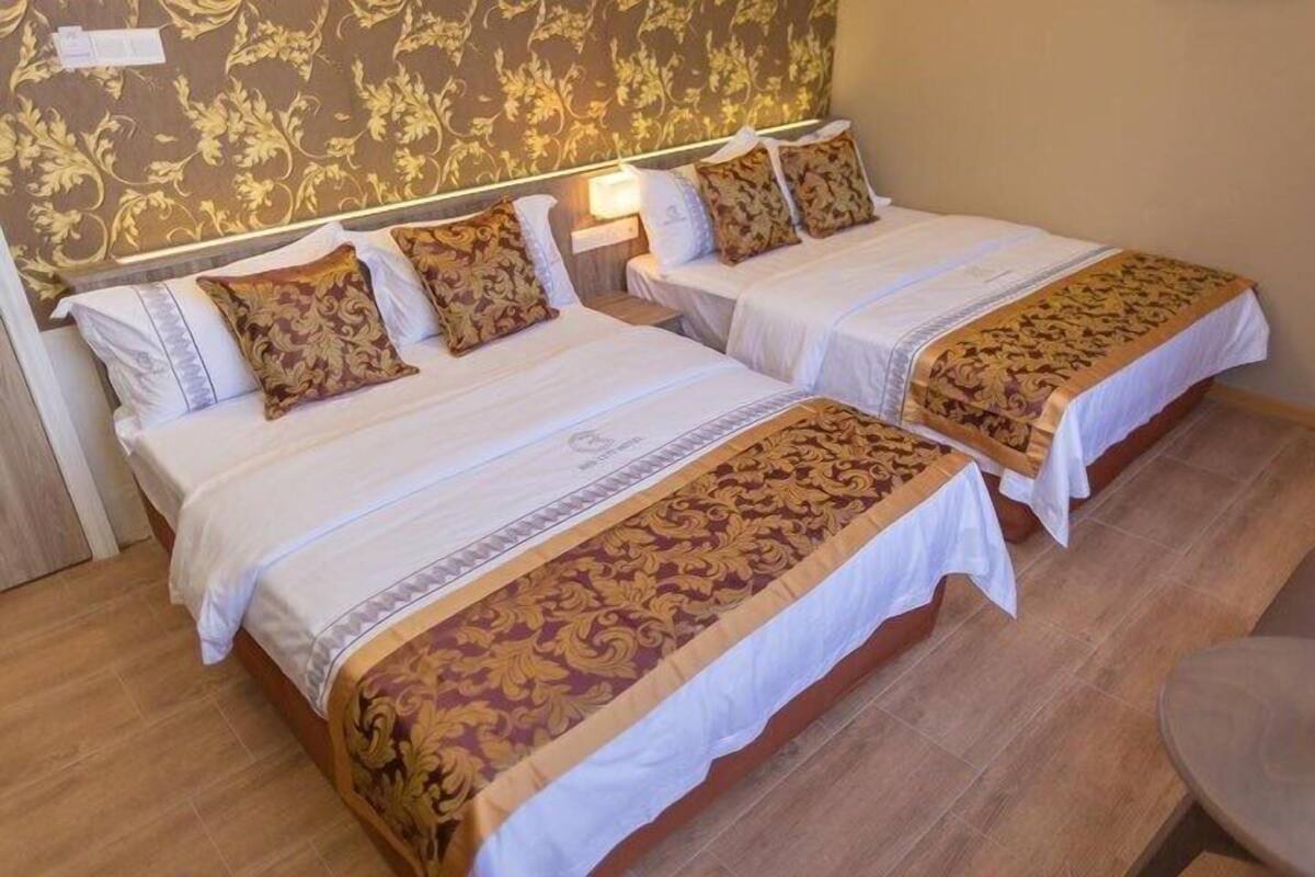 Family Quadruple Room | Desk, WiFi (free), bed sheets