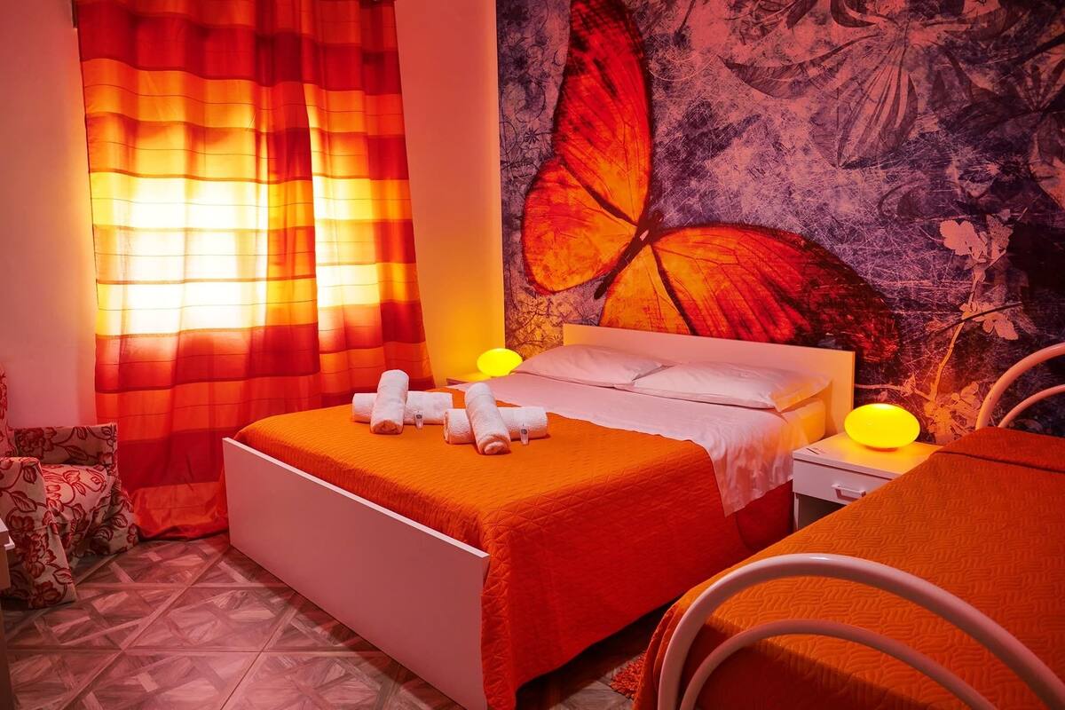 Triple Room (Farfalla) | Desk, rollaway beds (surcharge), WiFi (free), bed sheets