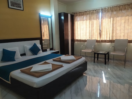 Superior Room Non AC | In-room safe, desk, bed sheets