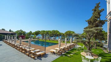 Seasonal outdoor pool, open 9:00 AM to 7:00 PM, free cabanas