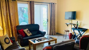 Basic Apartment | Living room | Flat-screen TV - 33 The Bridge Resort (St. Lucia)