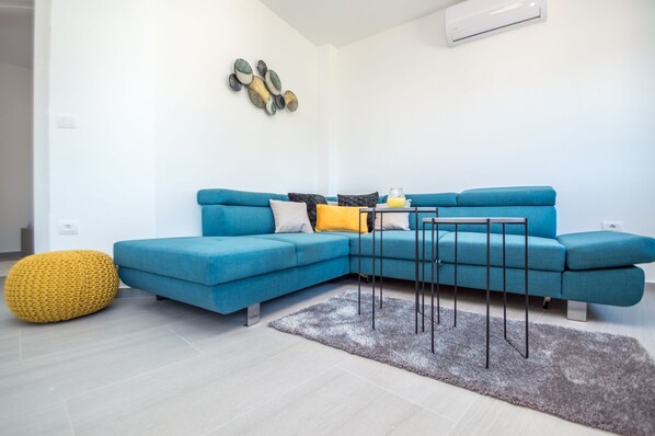 Appartement Exclusif (3) | Salle de séjour | Télévision à écran plat