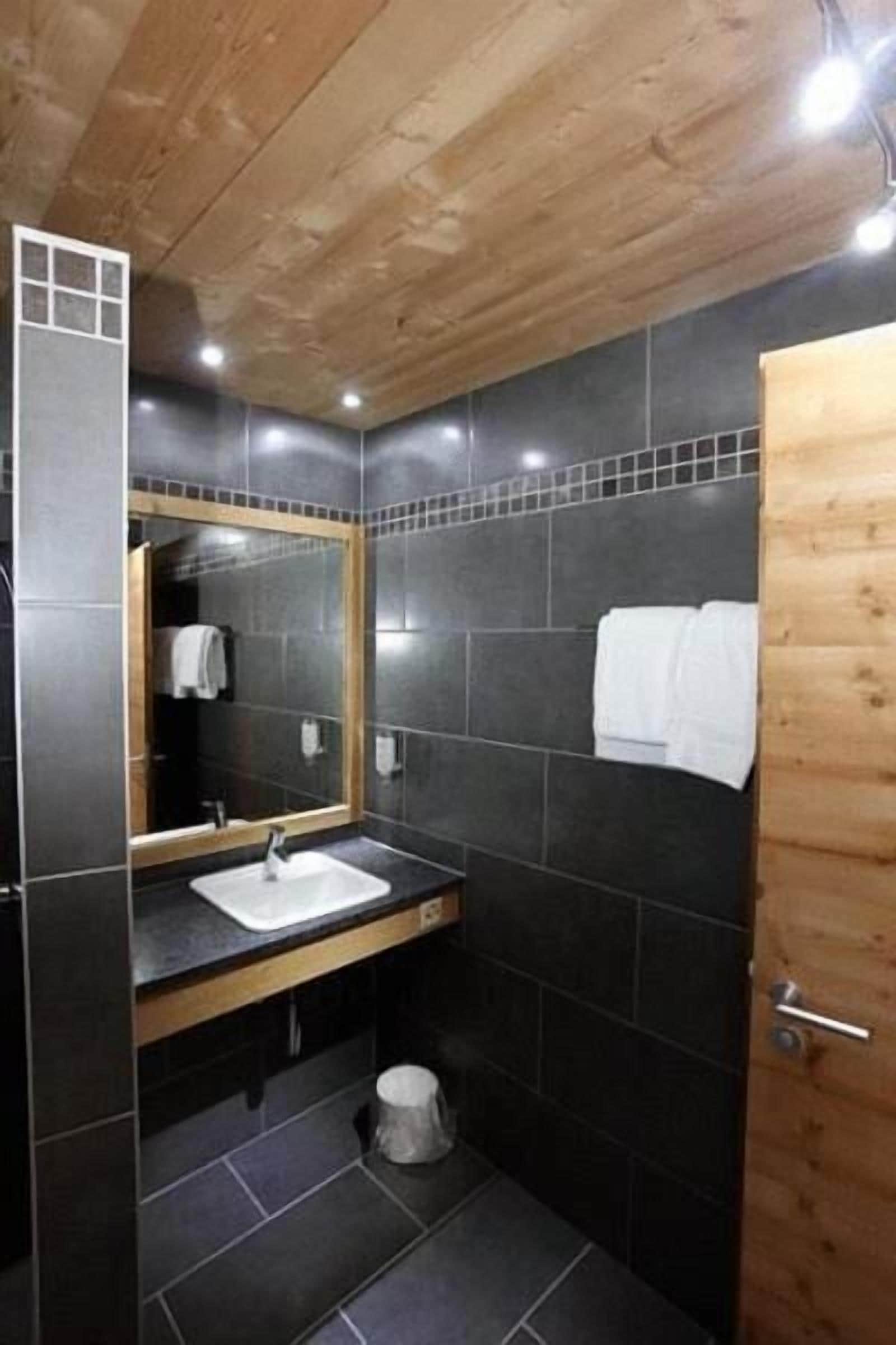 shower, hair dryer, bathrobes, slippers