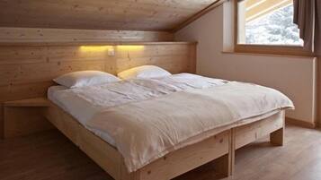 Blackout curtains, soundproofing, free cots/infant beds, rollaway beds