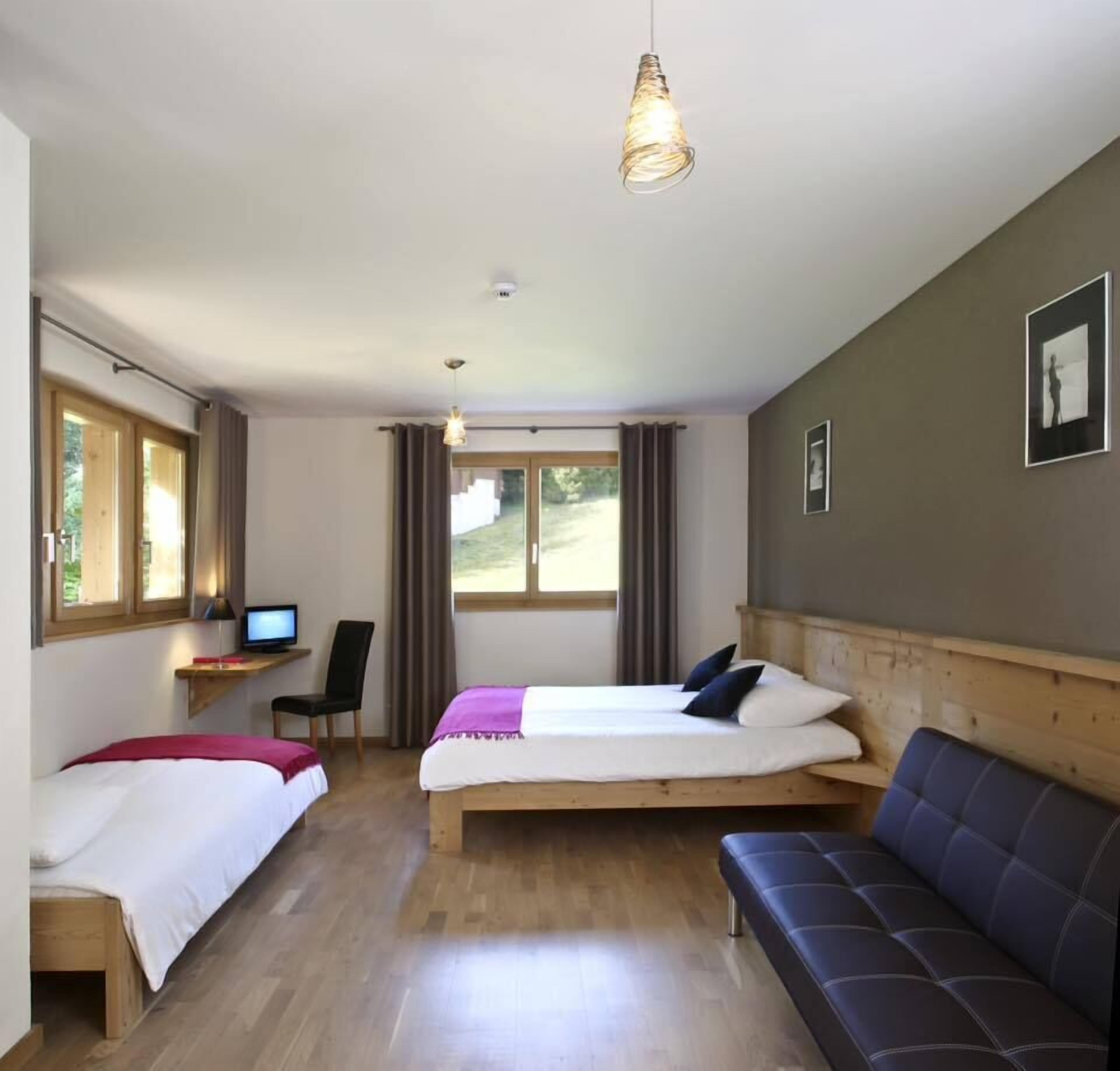 Blackout curtains, soundproofing, free cots/infant beds, rollaway beds