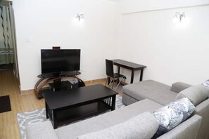 Apartment, 1 Bedroom | Living room | Flat-screen TV - Plainsville Apartments (Nairobi)