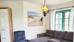 Departamento, 2 habitaciones | Área de sala de estar